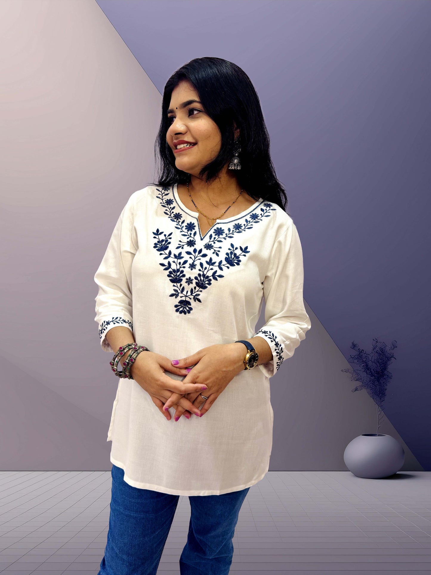 Elegant White Cotton Kurti with Blue Embroidery - The Sutra Space